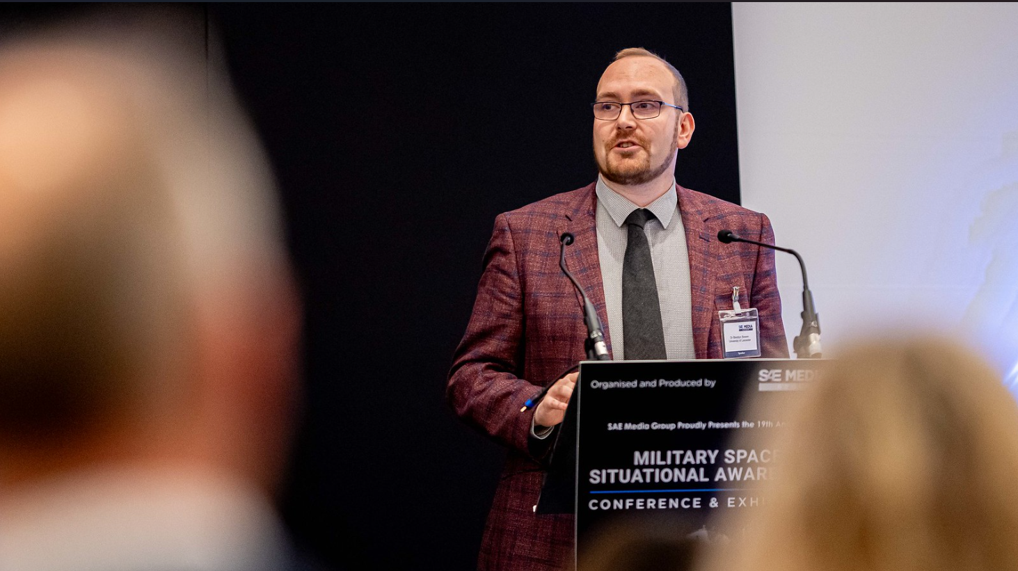 Bleddyn Bowen speaking at a Military SSA Conference